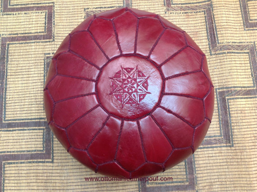 Put some Burgundy Lovely warm Red Leather Pouf from New York