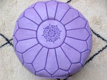 Load image into Gallery viewer, Purple Color relates to the imagination and spirituality get all this on our handmade leather ottoman pouf
