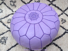 Load image into Gallery viewer, Purple Color relates to the imagination and spirituality get all this on our handmade leather ottoman pouf
