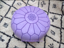 Load image into Gallery viewer, Purple Color relates to the imagination and spirituality get all this on our handmade leather ottoman pouf
